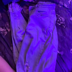 Ripped faded jeans light blue